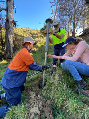 Installing soil moisture monitoring probes at a project site in South Gippsland